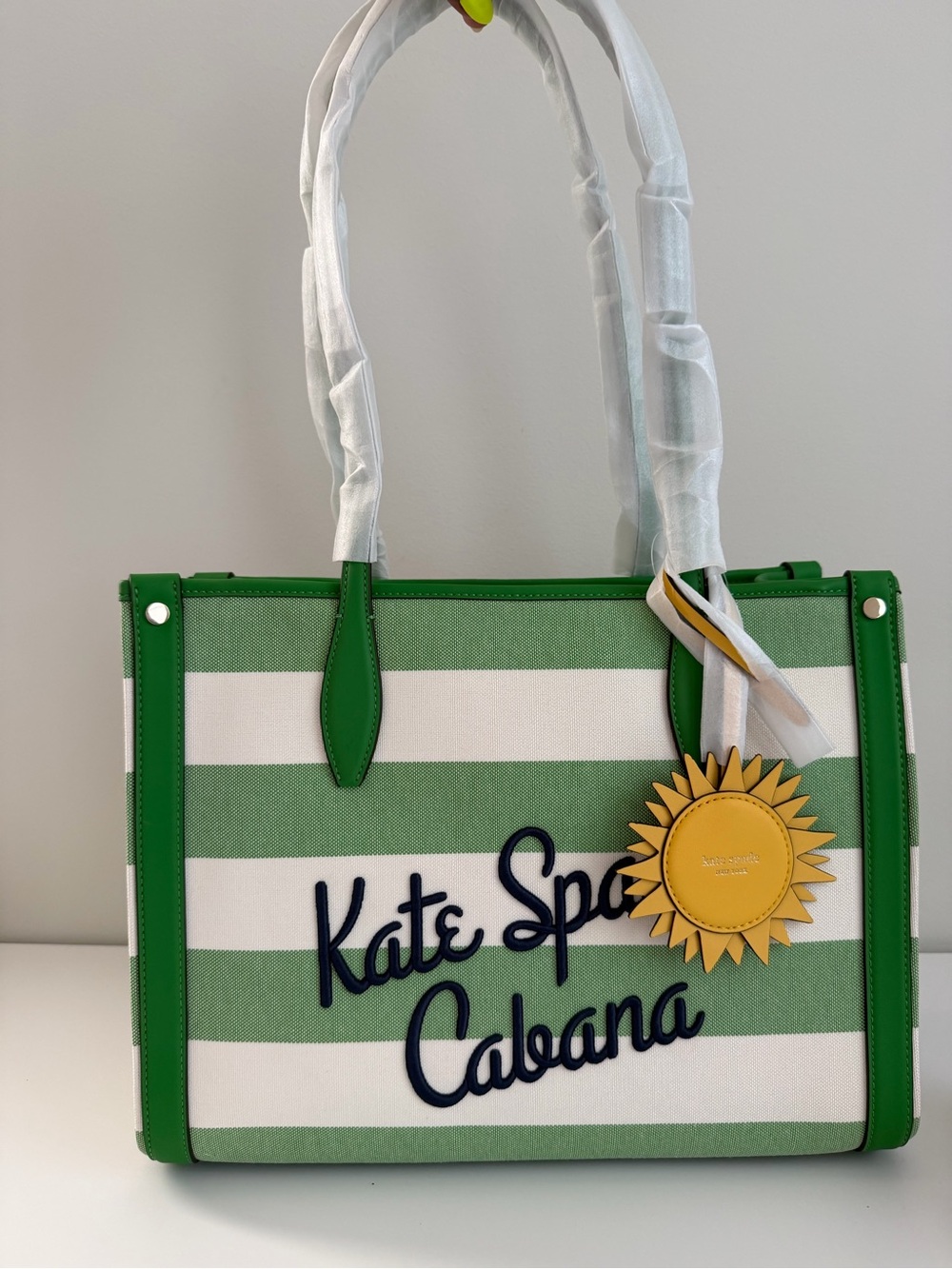 kate spade Green and White Striped Cabana Tote with Yellow Sun Charm